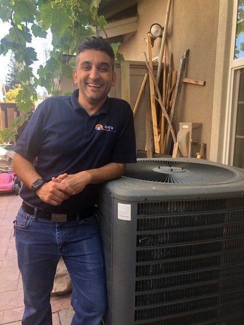 Air conditioning service & repair technician David Ghrahramany of Art's Heating & Cooling.
